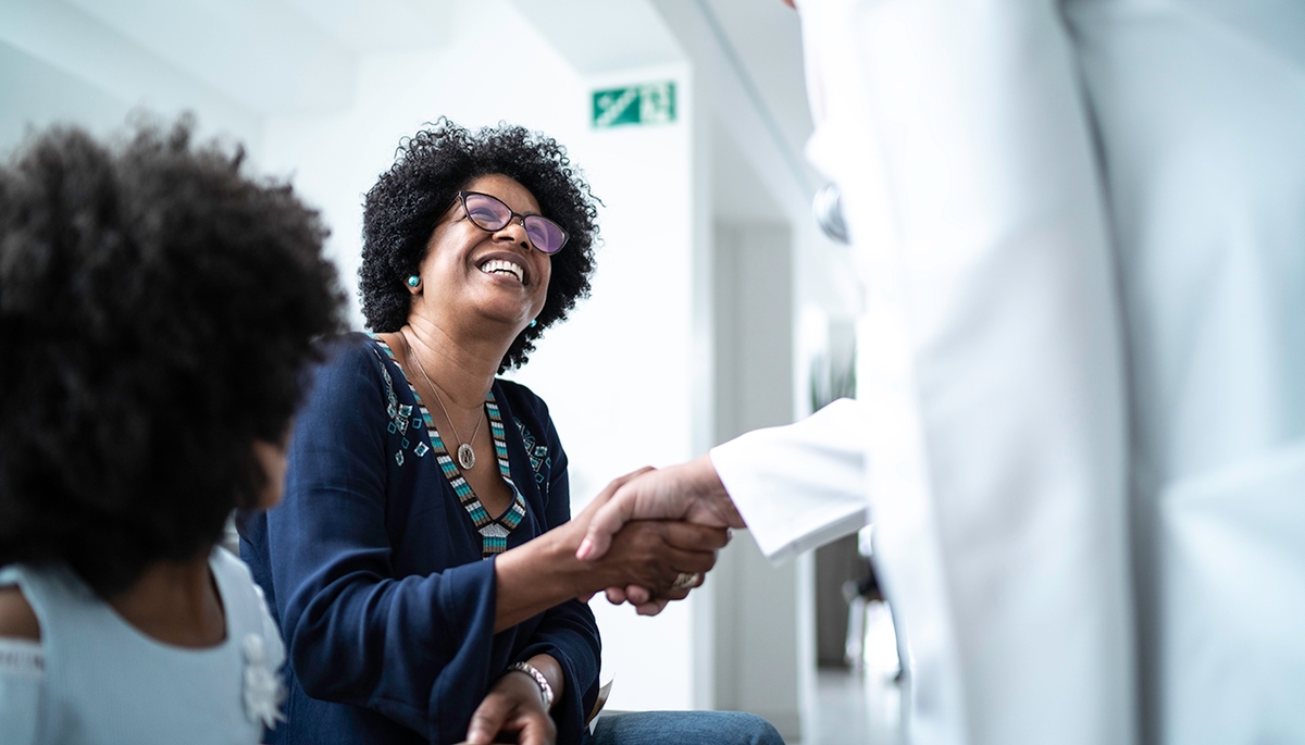 Doctor shaking patient's hand