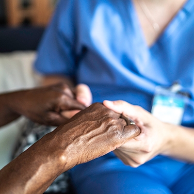 nurse holding hands