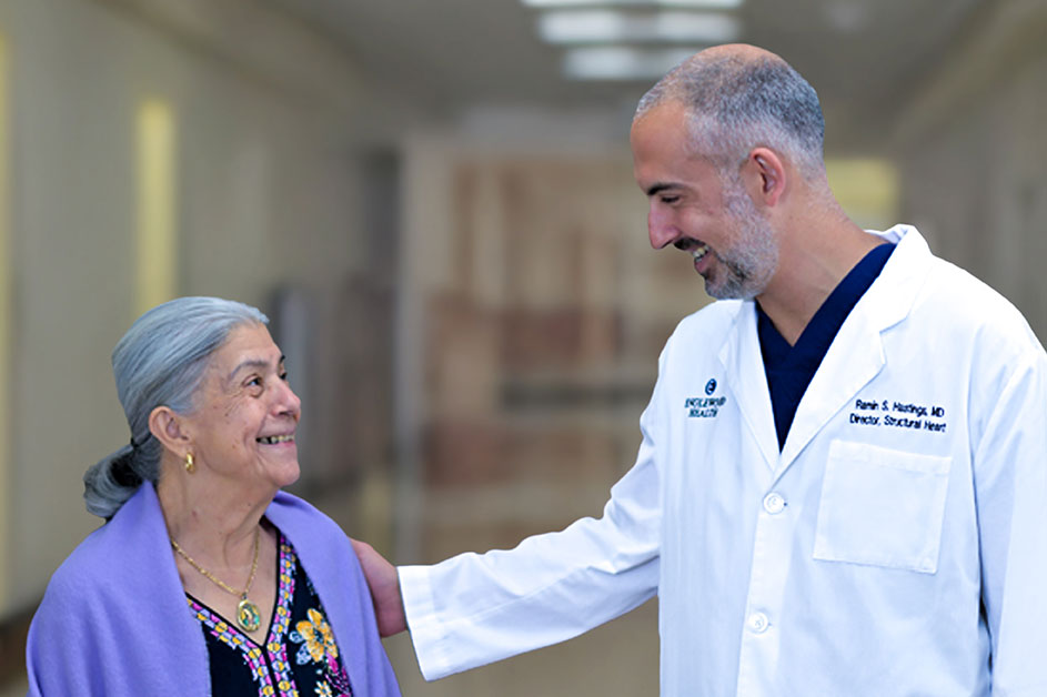 Dr. Ramin Hastings with a patient
